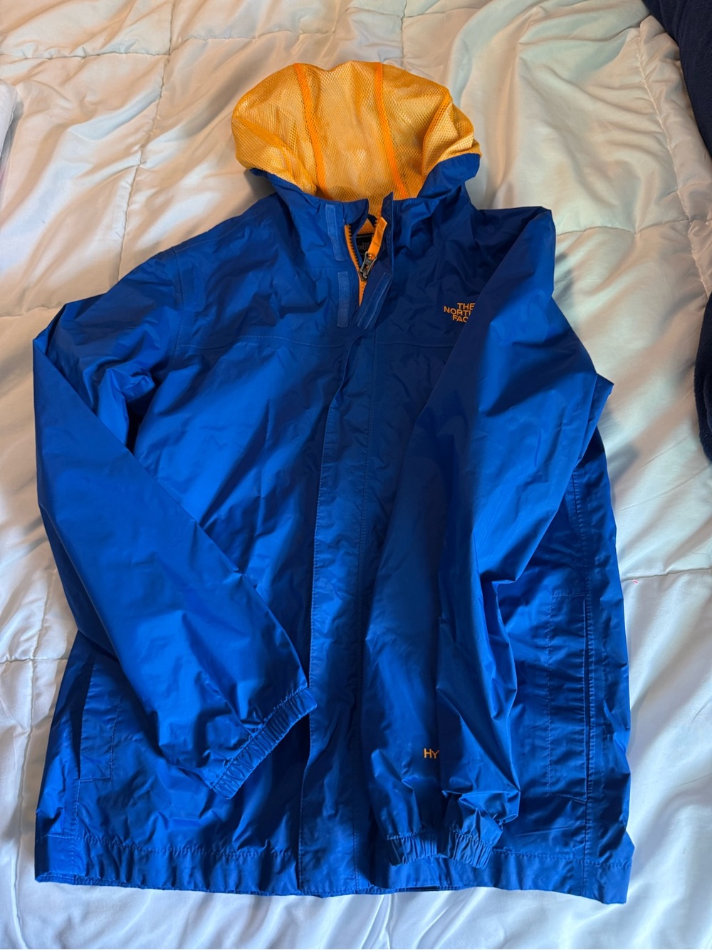 The North Face Blue Jacket with Yellow Lining
